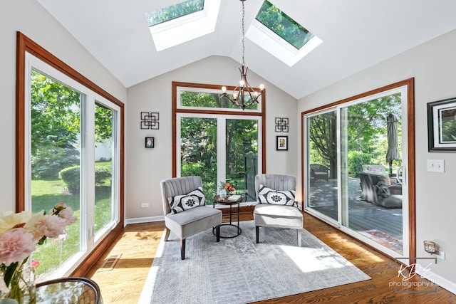 480 De Lasalle Ave, Naperville, IL 60565 - sunroom featuring a skylight, vaulted ceiling, a chandelier, and healthy amount of natural light