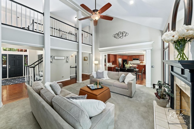 480 De Lasalle Ave, Naperville, IL 60565 - living area featuring a fireplace, high vaulted ceiling, stairway, a ceiling fan, and baseboards
