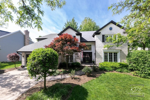 480 De Lasalle Ave, Naperville, IL 60565 - view of front of property with a garage, a front lawn, a shingled roof, driveway, and a chimney