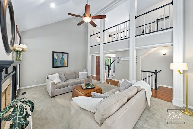 480 De Lasalle Ave, Naperville, IL 60565 - carpeted living room featuring high vaulted ceiling, a ceiling fan, baseboards, and stairway