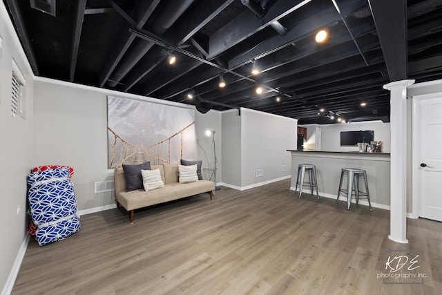480 De Lasalle Ave, Naperville, IL 60565 - sitting room with baseboards, wood finished floors, a dry bar, and rail lighting