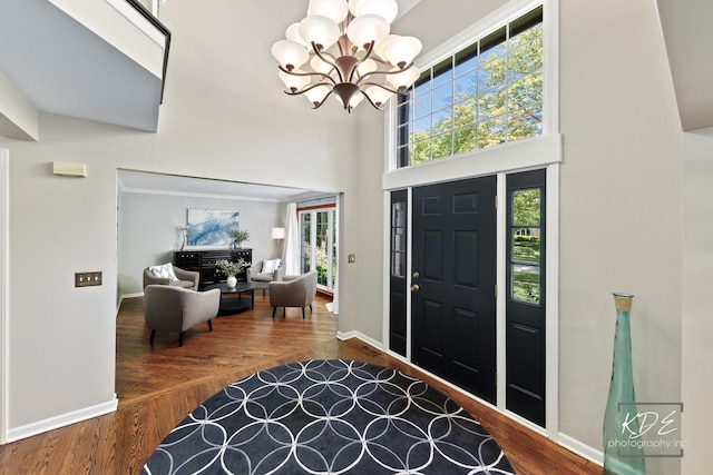 480 De Lasalle Ave, Naperville, IL 60565 - foyer with a chandelier, a high ceiling, wood finished floors, and baseboards