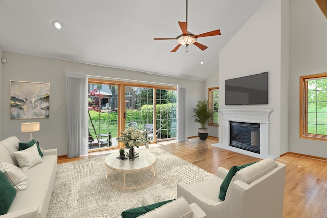 12195 Oxford Ct, Lemont, IL 60439 - living area featuring ceiling fan, a glass covered fireplace, high vaulted ceiling, wood finished floors, and baseboards