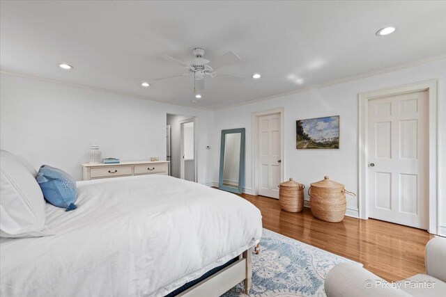 705 Hunter Rd, Glenview, IL 60025 - bedroom with recessed lighting, ornamental molding, light wood finished floors, a ceiling fan, and baseboards