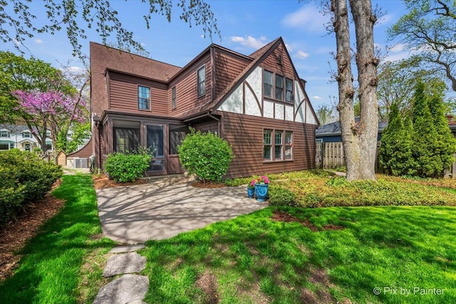 705 Hunter Rd, Glenview, IL 60025 - rear view of house with a patio area