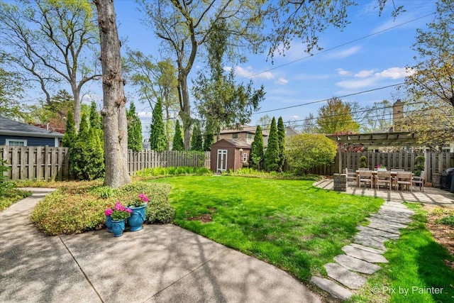 705 Hunter Rd, Glenview, IL 60025 - view of yard featuring a shed, a patio area, an outbuilding, and a pergola
