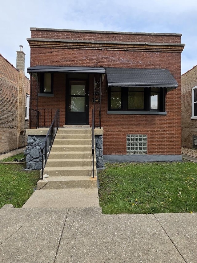 view of front facade with brick siding