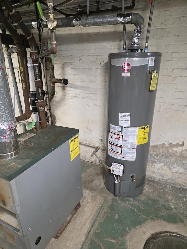 utility room with gas water heater