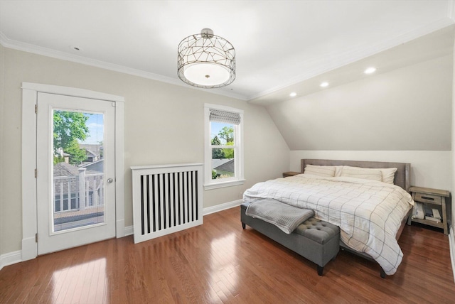 bedroom with multiple windows, wood finished floors, access to exterior, baseboards, and recessed lighting