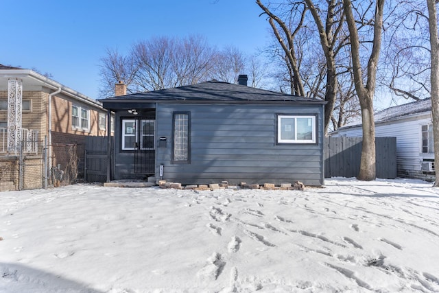 12509 S Bishop St, Calumet Park, IL 60827 - view of front of property featuring fence and a chimney