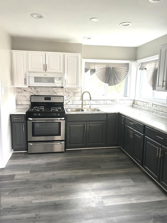 12509 S Bishop St, Calumet Park, IL 60827 - kitchen with gas stove, extractor fan, white cabinetry, tasteful backsplash, and recessed lighting
