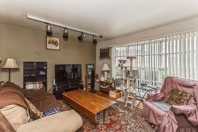 6555 W Addison St Unit A, Chicago, IL 60634 - living area with track lighting and a wall mounted air conditioner