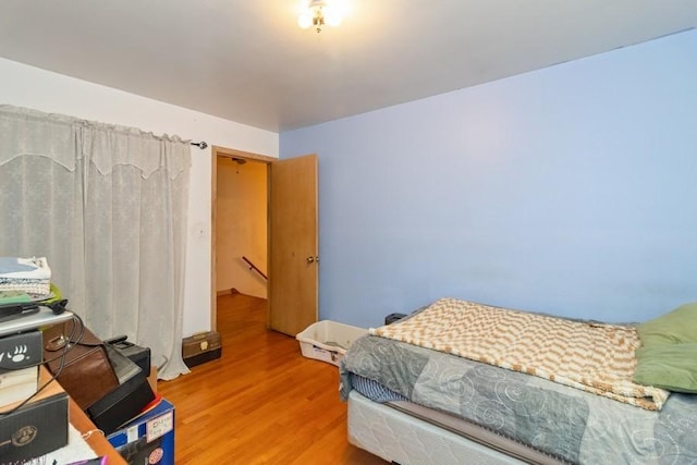 6555 W Addison St Unit A, Chicago, IL 60634 - bedroom featuring wood finished floors