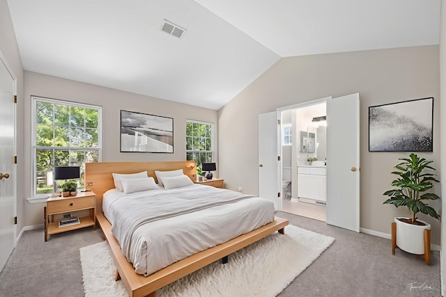 2248 Cheshire Dr, Aurora, IL 60502 - bedroom featuring lofted ceiling, light carpet, and ensuite bathroom