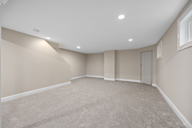 2248 Cheshire Dr, Aurora, IL 60502 - finished basement featuring light colored carpet and recessed lighting