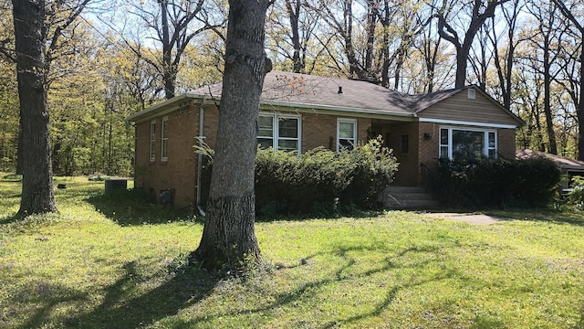 2119 E Exchange St, Crete, IL 60417 - view of front of property with a front lawn and brick siding