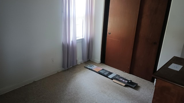 2119 E Exchange St, Crete, IL 60417 - unfurnished bedroom featuring a closet and light carpet