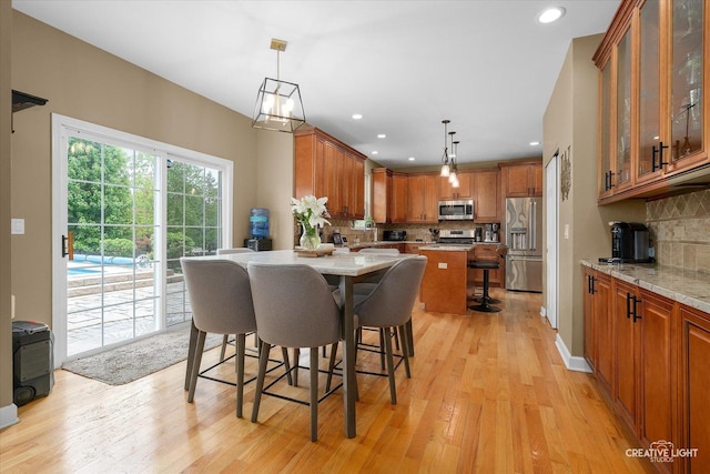 10650 Painted Desert Ct, Huntley, IL 60142 - dining room featuring light wood-style flooring and recessed lighting