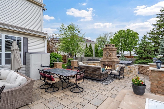 10650 Painted Desert Ct, Huntley, IL 60142 - view of patio / terrace featuring an outdoor living space with a fireplace, area for grilling, and outdoor dining area