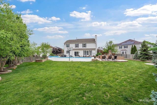 10650 Painted Desert Ct, Huntley, IL 60142 - rear view of house with a patio and a chimney