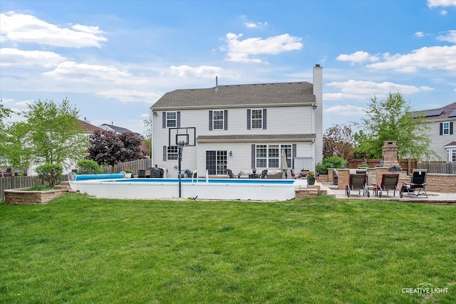 10650 Painted Desert Ct, Huntley, IL 60142 - rear view of house with a patio area and a chimney