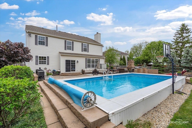 10650 Painted Desert Ct, Huntley, IL 60142 - view of swimming pool featuring a covered pool, an outdoor living space, and a patio