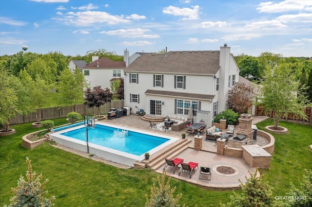 10650 Painted Desert Ct, Huntley, IL 60142 - rear view of house featuring an outdoor living space with a fire pit, a patio area, roof with shingles, and a chimney
