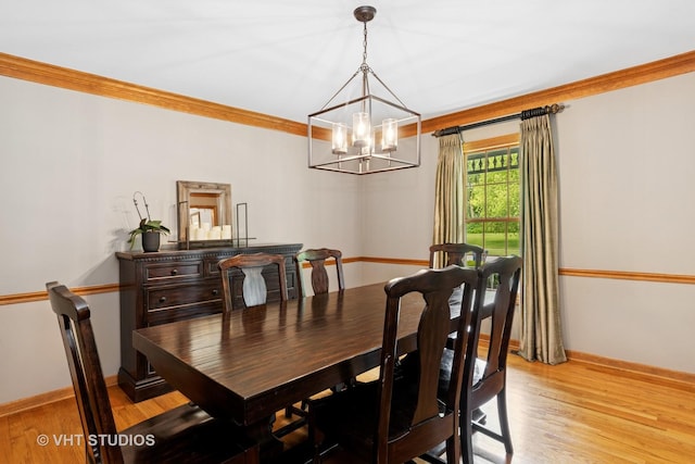 16 Rock River Ct, Naperville, IL 60565 - dining room featuring a chandelier, crown molding, light wood-style flooring, and baseboards