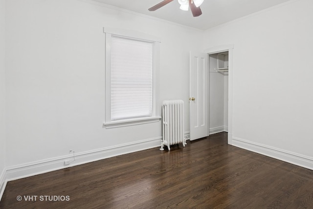 5814 N Campbell Ave, Chicago, IL 60659 - unfurnished bedroom with radiator heating unit, dark wood-style floors, ornamental molding, a closet, and a ceiling fan