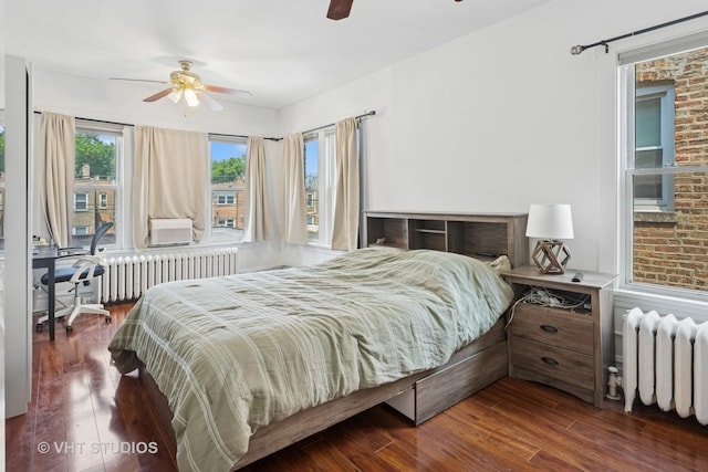 5814 N Campbell Ave, Chicago, IL 60659 - bedroom featuring radiator, wood finished floors, and a ceiling fan