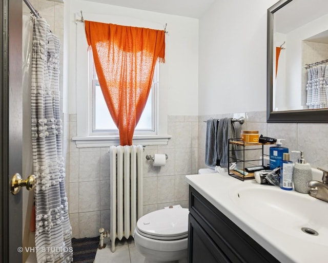 5814 N Campbell Ave, Chicago, IL 60659 - full bathroom featuring radiator heating unit, vanity, tile walls, tile patterned floors, and a shower with shower curtain
