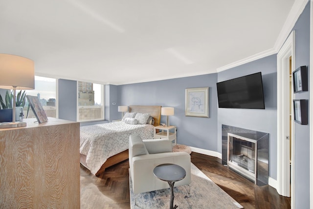 2626 N Lakeview Ave Unit 2703, Chicago, IL 60614 - bedroom with baseboards, a glass covered fireplace, and ornamental molding