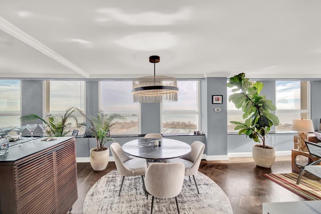 2626 N Lakeview Ave Unit 2703, Chicago, IL 60614 - dining area featuring a chandelier, healthy amount of natural light, and baseboards