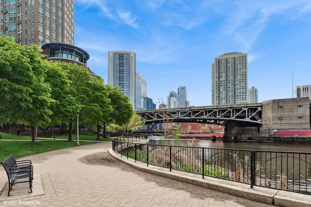 510 W Erie St Unit 1606, Chicago, IL 60654 - view of community with a skyline view, a water view, and fence