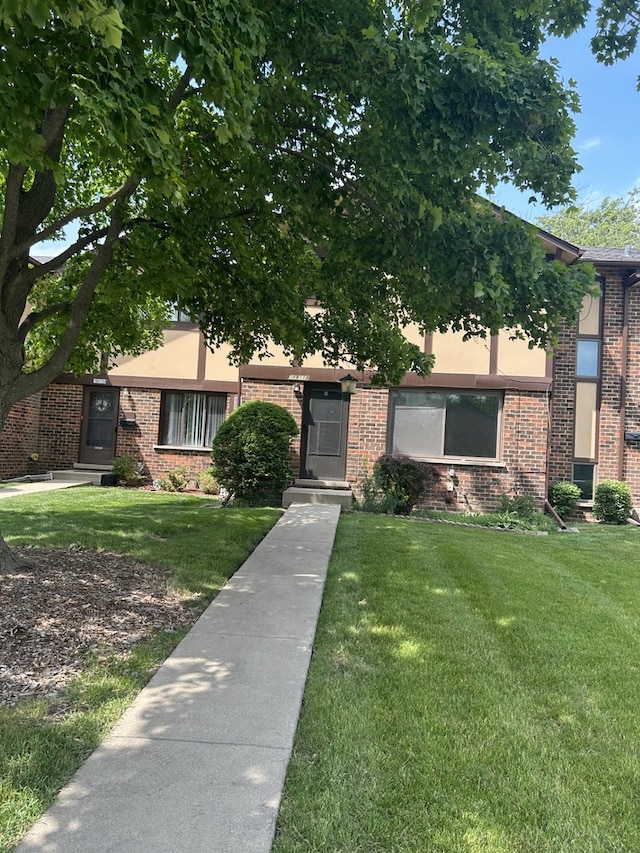 18W118 14th St, Villa Park, IL 60181 - view of front of home with a front lawn and brick siding