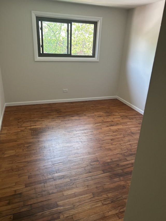 18W118 14th St, Villa Park, IL 60181 - empty room with dark wood-style flooring