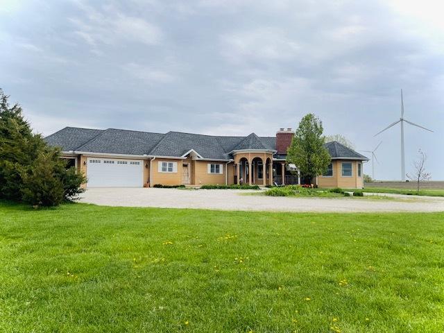 1976 E 24th Rd, Ransom, IL 60470 - view of front of home with a front yard, a chimney, and an attached garage