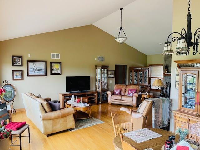 1976 E 24th Rd, Ransom, IL 60470 - living area featuring wood finished floors and high vaulted ceiling