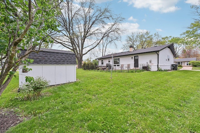 700 Delphia Ave, Elk Grove Village, IL 60007 - view of yard with a storage shed and an outbuilding