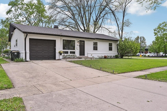 700 Delphia Ave, Elk Grove Village, IL 60007 - ranch-style house featuring a garage, a front lawn, driveway, and a chimney