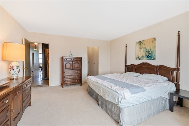 bedroom with light colored carpet
