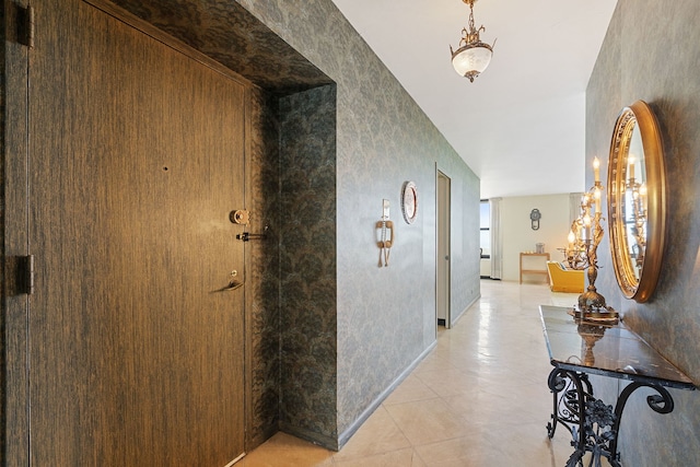 hallway with light tile patterned flooring