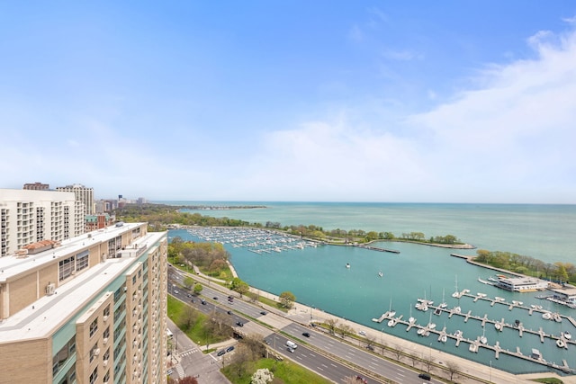 water view with nearby urban area and a marina