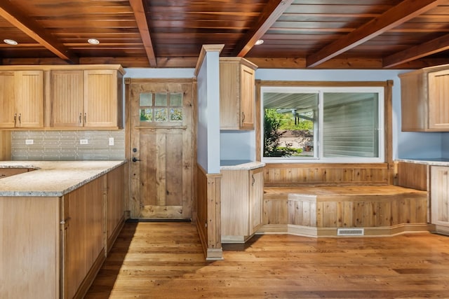 715 Root St, New Lenox, IL 60451 - kitchen featuring beam ceiling, healthy amount of natural light, wooden ceiling, light brown cabinets, and light wood-style flooring