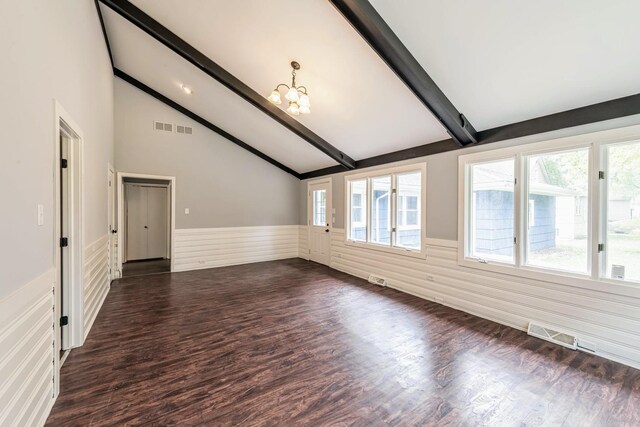 unfurnished room with wainscoting, a chandelier, and dark wood-style floors