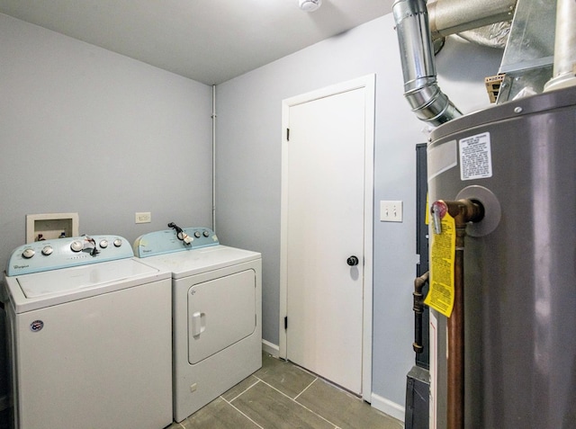 washroom featuring separate washer and dryer and tile patterned flooring