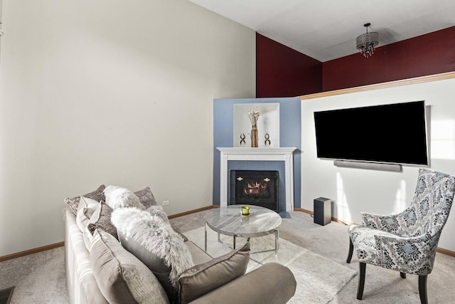 21628 Dogwood Rd Unit 120-3, Matteson, IL 60443 - living room with carpet floors, baseboards, a fireplace, and lofted ceiling
