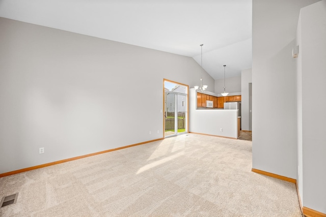 21315 W Edison Ln, Plainfield, IL 60544 - unfurnished living room featuring baseboards, light colored carpet, and vaulted ceiling