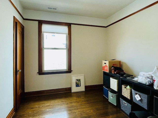 4623 S Harding Ave, Chicago, IL 60632 - empty room featuring dark wood-style flooring and baseboards