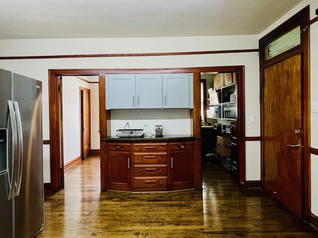 4623 S Harding Ave, Chicago, IL 60632 - kitchen featuring stainless steel fridge with ice dispenser, dark wood-type flooring, tasteful backsplash, and baseboards